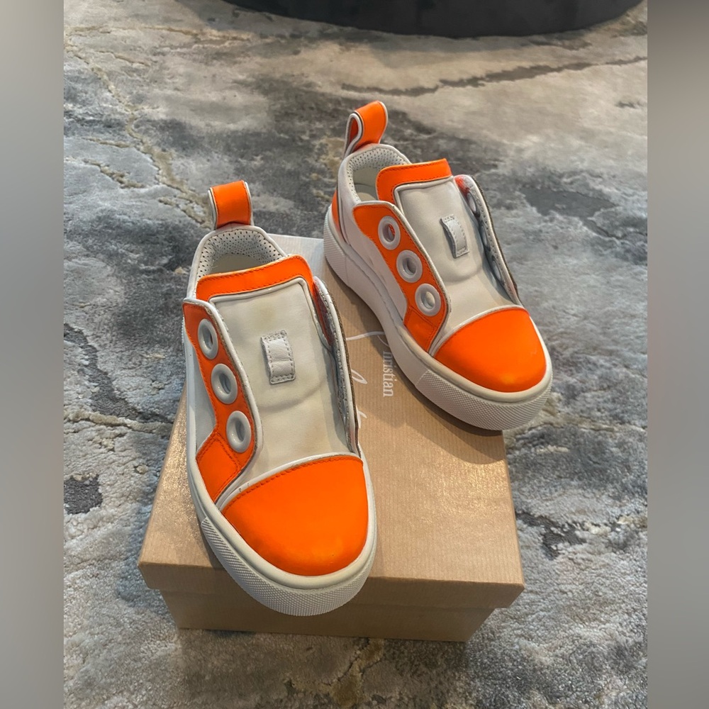Little Girls Low Top Christian Louboutin gym shoes.